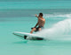 Carving on a LIND electric surfboard in the Caribbean